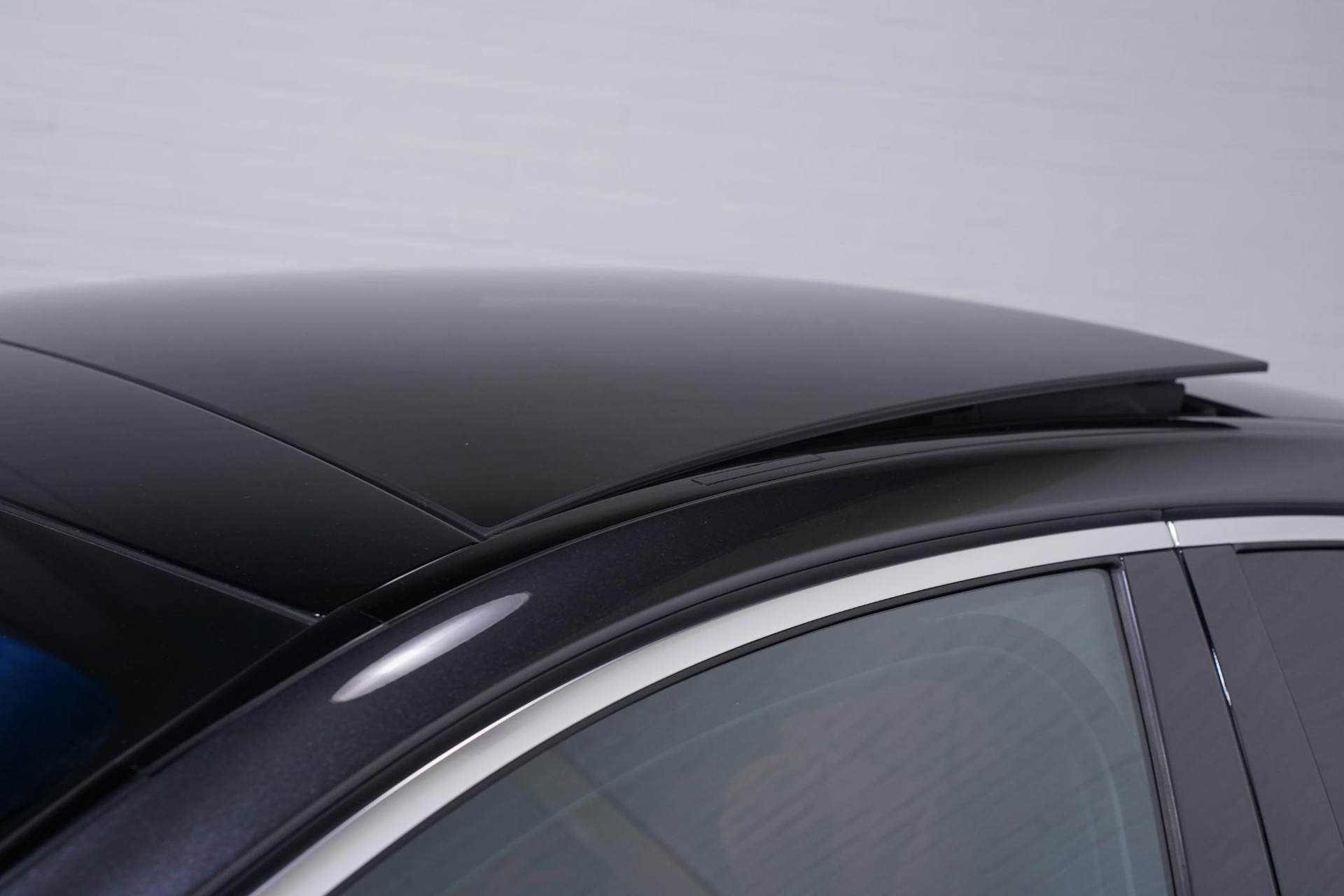 Panoramaschuifdak met comfort- en automatische regensluiting, elektrische zonnerollo