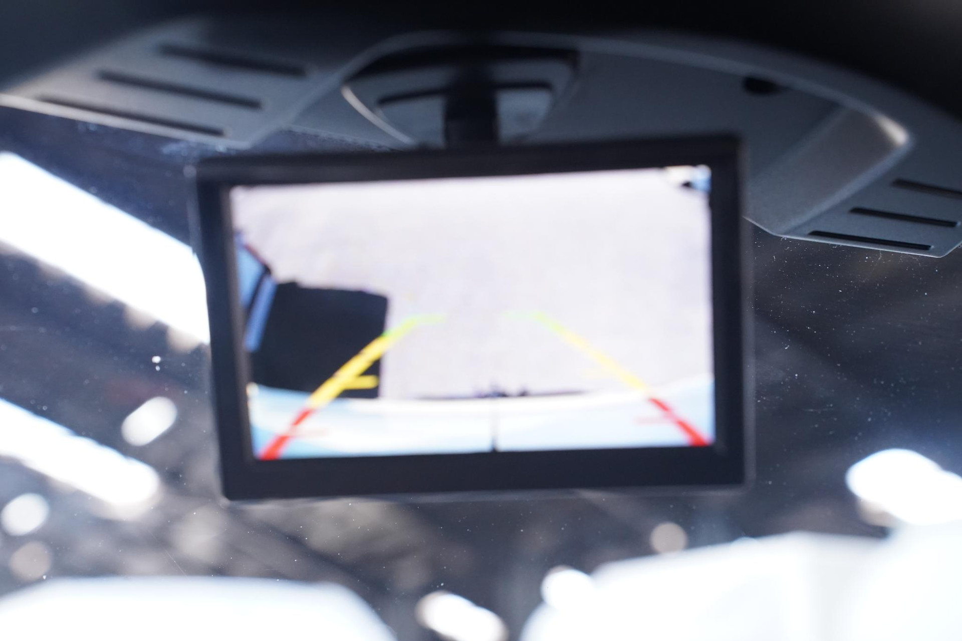 Camera systeem achter icm spot en derde remlicht
